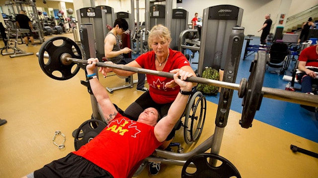 TORONTO, ON - MARCH 23 - Retired Corporal Christine Gauthier spots Retired Corporal Natacha Dupuis. Canadian Invictus Games athletes during their last training day before they head off for the 2016 games. The Invictus Games are paralympic-style games, created by Prince Harry, for former and current soliders who were injured in the line of duty. Toronto will host the games in 2017. (Carlos Osorio/Toronto Star via Getty Images)