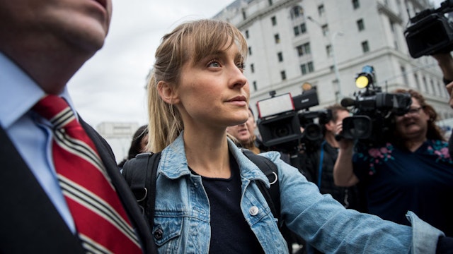 NEW YORK, NY - APRIL 24: Actress Allison Mack leaves U.S. District Court for the Eastern District of New York after a bail hearing, April 24, 2018 in the Brooklyn borough of New York City. Mack was charged last Friday with sex trafficking for her involvement with a self-help organization for women that forced members into sexual acts with their leader. The group, called Nxivm, was led by founder Keith Raniere, who was arrested in March on sex-trafficking charges. She was released on bail at $5 million. (Photo by Drew Angerer/Getty Images)