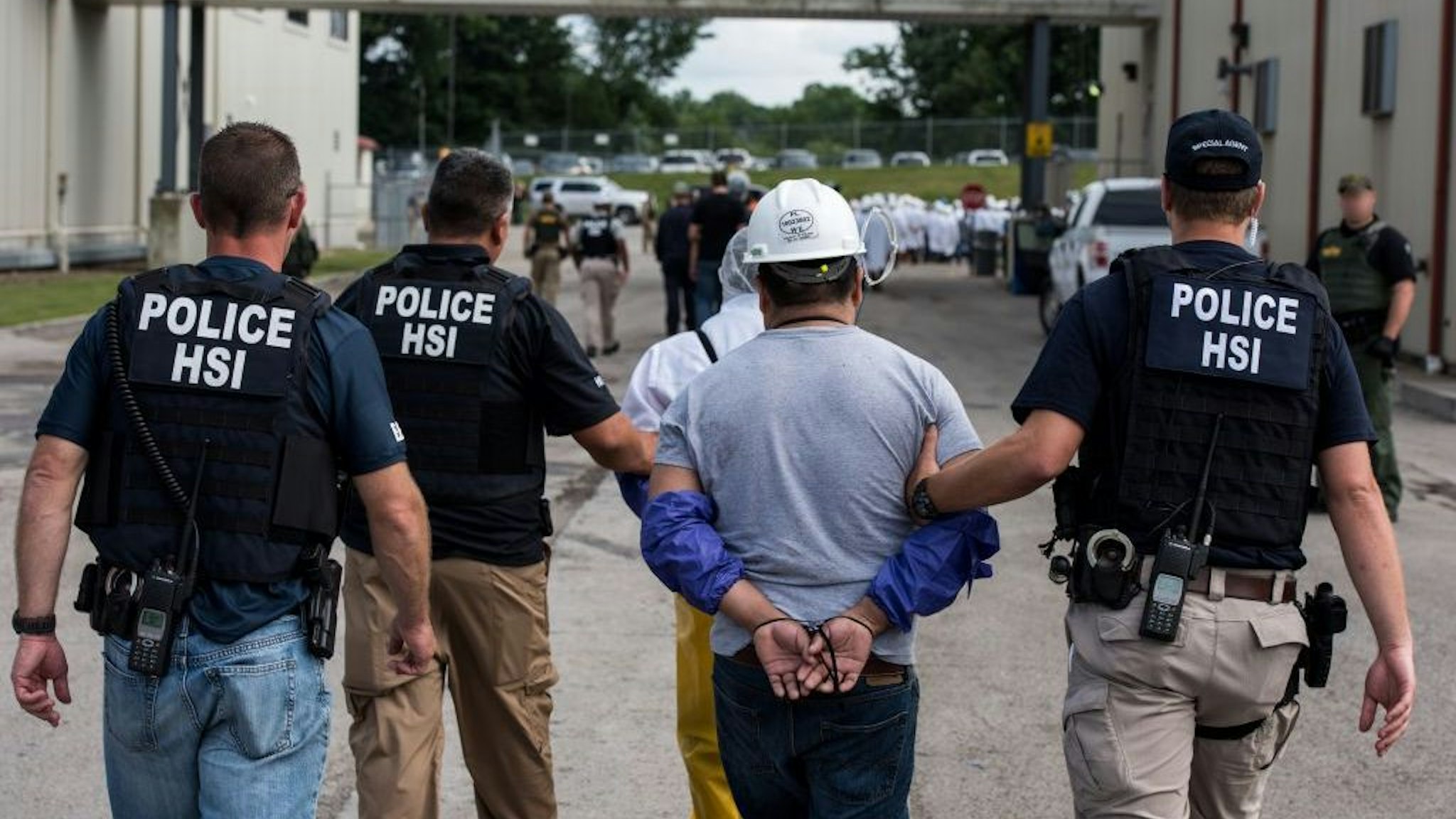US Immigration and Customs Enforcement's (ICE) Homeland Security Investigations (HSI) special agents arrested alleged immigration violators at Fresh Mark, Salem, June 19, 2018. Image courtesy ICE ICE / U.S. Immigration and Customs Enforcement. (Photo by Smith Collection/Gado/Getty Images)