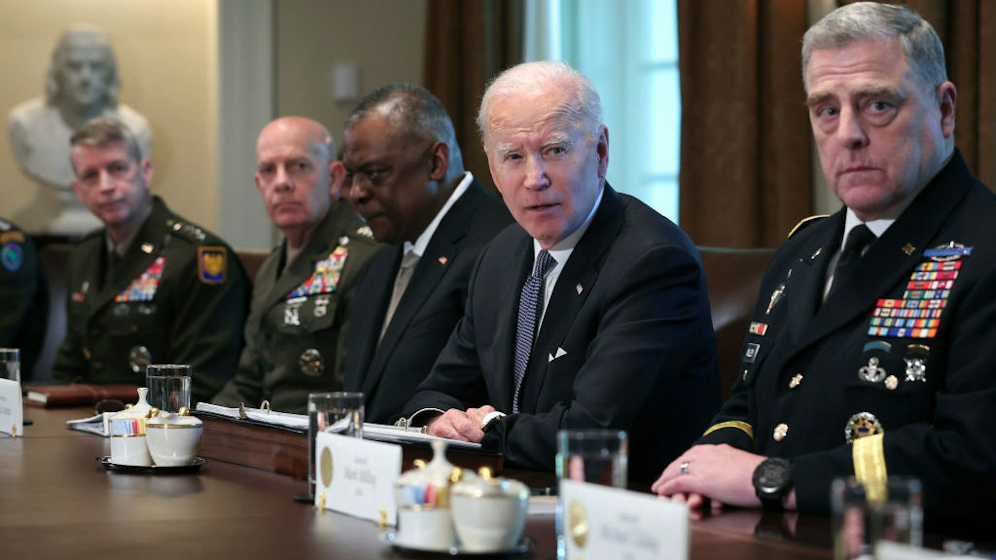 WASHINGTON, DC - APRIL 20: U.S. President Joe Biden meets with Secretary of Defense Lloyd Austin (3rd L), Chairman of the Joint Chiefs of Staff Gen. Mark Milley (R), members of the Joint Chiefs of Staff, and combatant commanders in the Cabinet Room of the White House April 20, 2022 in Washington, DC. Biden discussed the current situation in Ukraine with military leaders during the meeting. (Photo by Win McNamee/Getty Images)