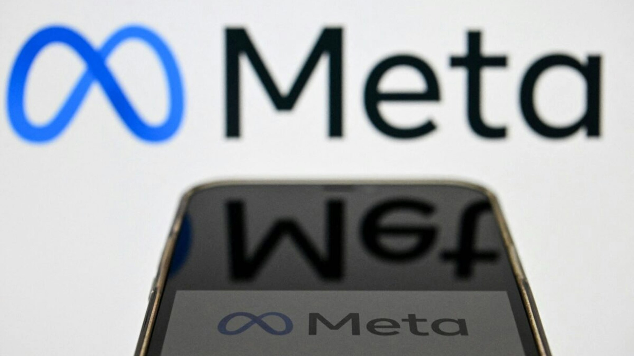 Photo taken on October 28, 2022, shows the META logo on a smartphone screen in Moscow