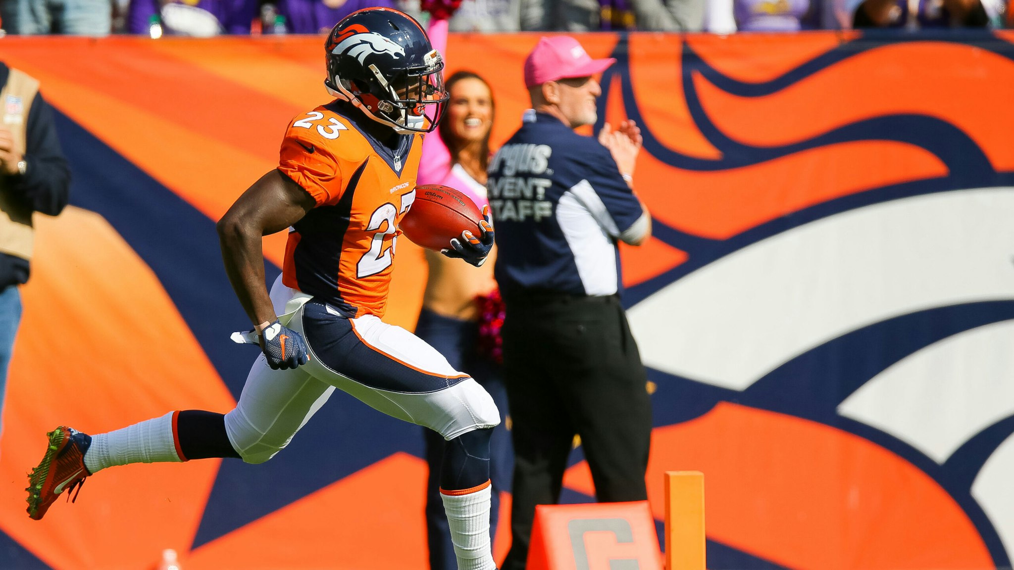DENVER, CO - OCTOBER 4: Running back Ronnie Hillman #23 of the Denver Broncos scores a touchdown on an 72 yard rush in the second quarter of a game against the Minnesota Vikings at Sports Authority Field at Mile High on October 4, 2015 in Denver, Colorado.