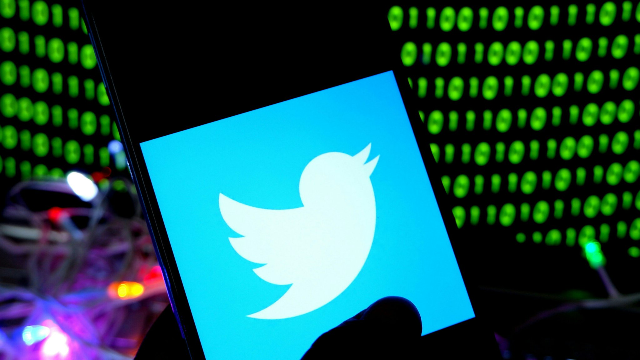 INDIA - 2022/10/25: In this photo illustration, a Twitter logo is displayed on a smartphone.