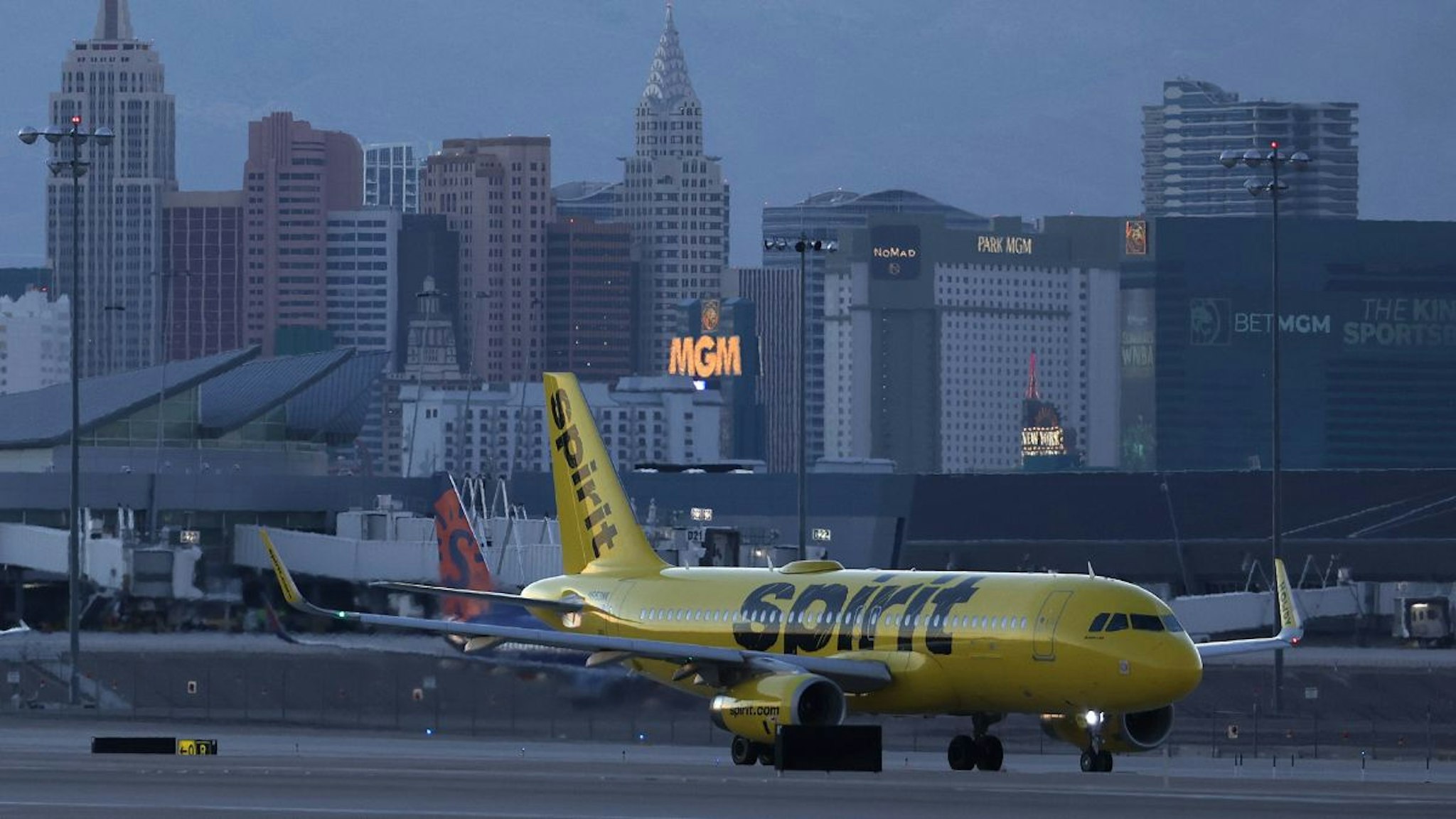 A Spirit Airlines plane taxis at Harry Reid International Airport on October 14, 2022 in Las Vegas, Nevada.