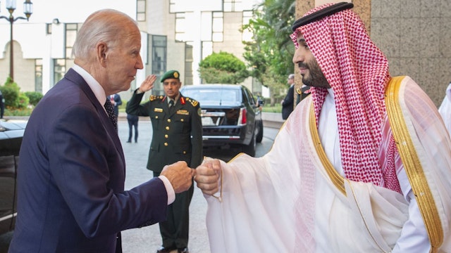 US President Joe Biden (L) being welcomed by Saudi Arabian Crown Prince Mohammed bin Salman (R) at Alsalam Royal Palace in Jeddah, Saudi Arabia on July 15, 2022.