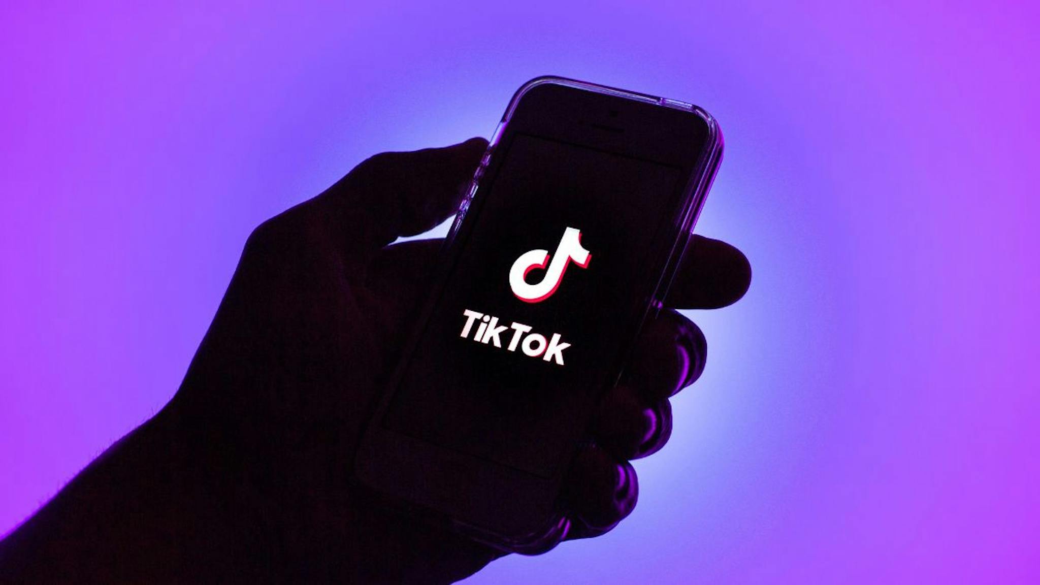 TIkTok In this photo illustration, a Tik Tok logo seen displayed on a smartphone.