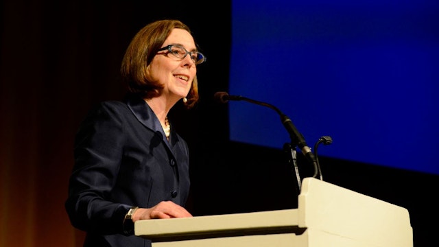 Oregon Governor Kate Brown speaks on Stage at the Oregon Consular Corps Celebrate Trade Gala at the Portland Art Museum in Portland, Oregon, USA on 18th May 2015.