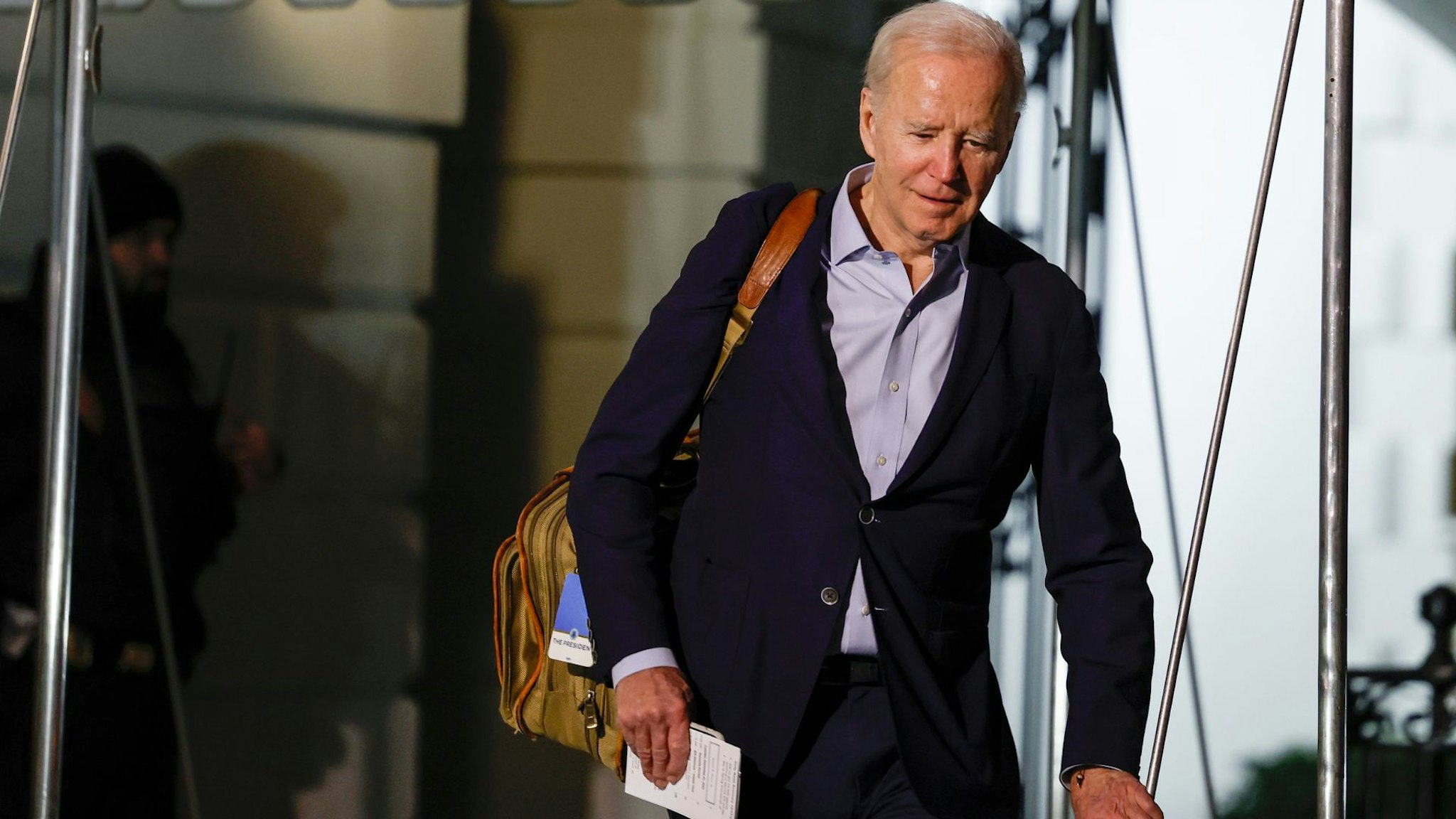 WASHINGTON, DC - DECEMBER 27: U.S. President Joe Biden walks to speak to reporters as he and first lady Jill Biden leave the White House and walk to Marine One on the South Lawn on December 27, 2022 in Washington, DC. The Bidens are spending the New Years holiday in St. Croix, United States Virgin Islands.