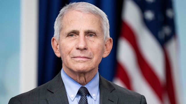 Dr. Anthony Fauci, White House Chief Medical Advisor and Director of the National Institute of Allergy and Infectious Diseases, attends an event with First Lady Jill Biden to urge Americans to get vaccinated ahead of the holiday season, during a COVID-19 virtual event with AARP in the Eisenhower Executive Office Building in Washington, DC, December 9, 2022. - The First Lady is hosting a virtual town hall event to talk about the importance of getting an updated Covid-19 vaccine this holiday season, especially for Americans ages 50 and older.