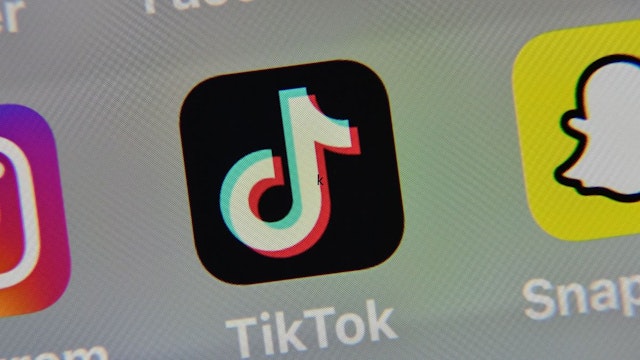 This illustration picture taken on May 5, 2020 in Lille shows the logo of the networking application Tik ToK on the screen of a tablet.