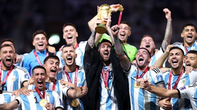Lionel Messi of Argentina lifts the FIFA World Cup Qatar 2022 Winner's Trophy during the FIFA World Cup Qatar 2022 Final match between Argentina and France at Lusail Stadium on December 18, 2022 in Lusail City, Qatar.
