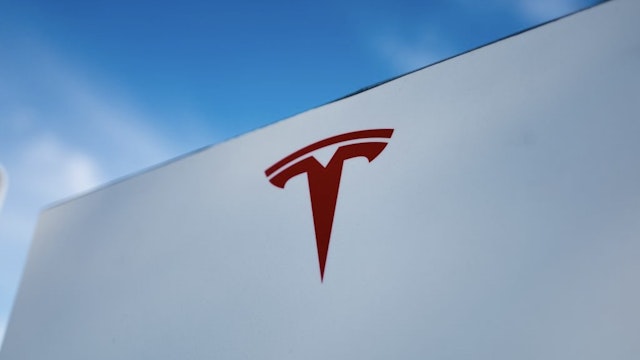 Tesla Motors Close-up of Tesla Motors logo against a bright blue sky in Pleasanton, California, July 23, 2018. (Photo by Smith Collection/Gado/Getty Images) Smith Collection/Gado / Contributor Photo by Smith Collection/Gado/ Contributor/Getty Images