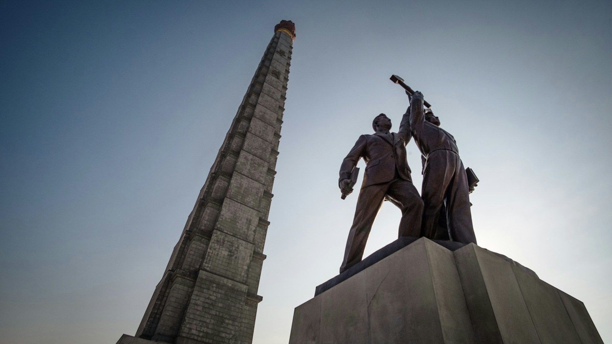 Juche Tower and Workers' Party monument in Pyongyang, North Korea - stock photo Juche Tower and Workers' Party monument in Pyongyang, North Korea on 01.01.2019 Pablo Bonfiglio via Getty Images