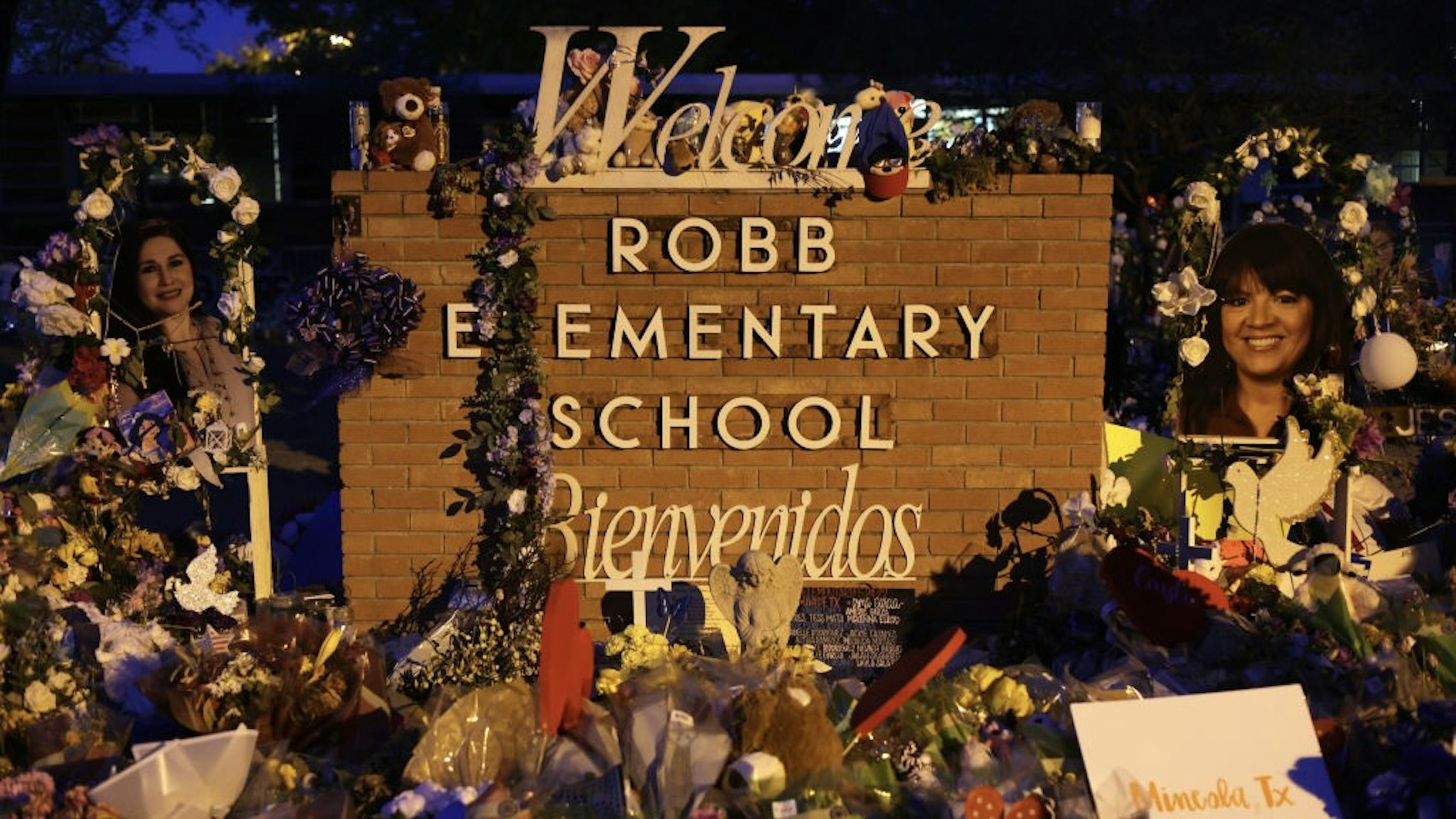 Uvalde Families Grieve For Loved Ones Killed In School Mass Shooting UVALDE, TEXAS - JUNE 03: Flowers and photographs are seen at a memorial dedicated to the victims of the mass shooting at Robb Elementary School on June 3, 2022 in Uvalde, Texas. 19 students and two teachers were killed on May 24 after an 18-year-old gunman opened fire inside the school. Wakes and funerals for the 21 victims are scheduled throughout the week. (Photo by Alex Wong/Getty Images) Alex Wong / Staff