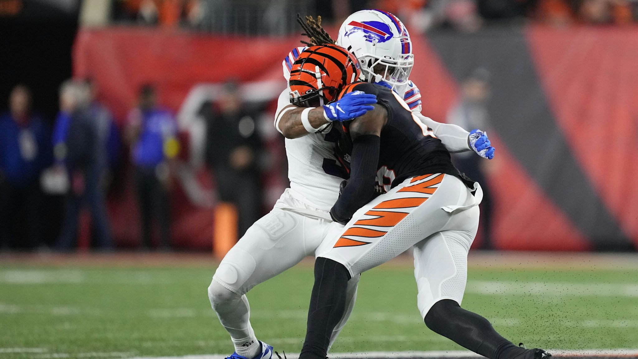 CINCINNATI, OHIO - JANUARY 02: Damar Hamlin #3 of the Buffalo Bills tackles Tee Higgins #85 of the Cincinnati Bengals during the first quarter at Paycor Stadium on January 02, 2023 in Cincinnati, Ohio. Hamlin was taken off the field by medical personnel following the play.