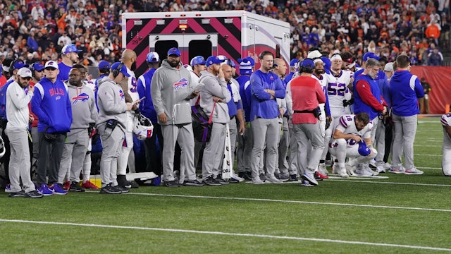 Buffalo Bills players look on after teammate Damar Hamlin #3 collapsed on the field after making a tackle against the Cincinnati Bengals during the first quarter at Paycor Stadium on January 02, 2023 in Cincinnati, Ohio.
