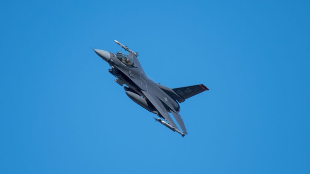 23 February 2022, Rhineland-Palatinate, Spangdahlem: An F-16 fighter aircraft flies over the Eifel near Spangdahlem. Photo: Harald Tittel/dpa (Photo by Harald Tittel/picture alliance via Getty Images)