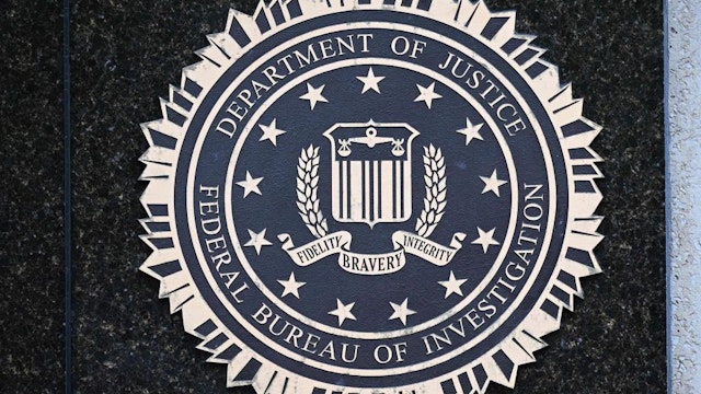 The seal of the Federal Bureau of Investigation is seen outside of its headquarters in Washington, DC on August 15, 2022. - Threats against the FBI and law enforcement agencies have increased following the search and seizure of top secret documents from former US president Donald Trump's Mar-a-Lago estate where he resides. (Photo by MANDEL NGAN / AFP) (Photo by MANDEL NGAN/AFP via Getty Images)