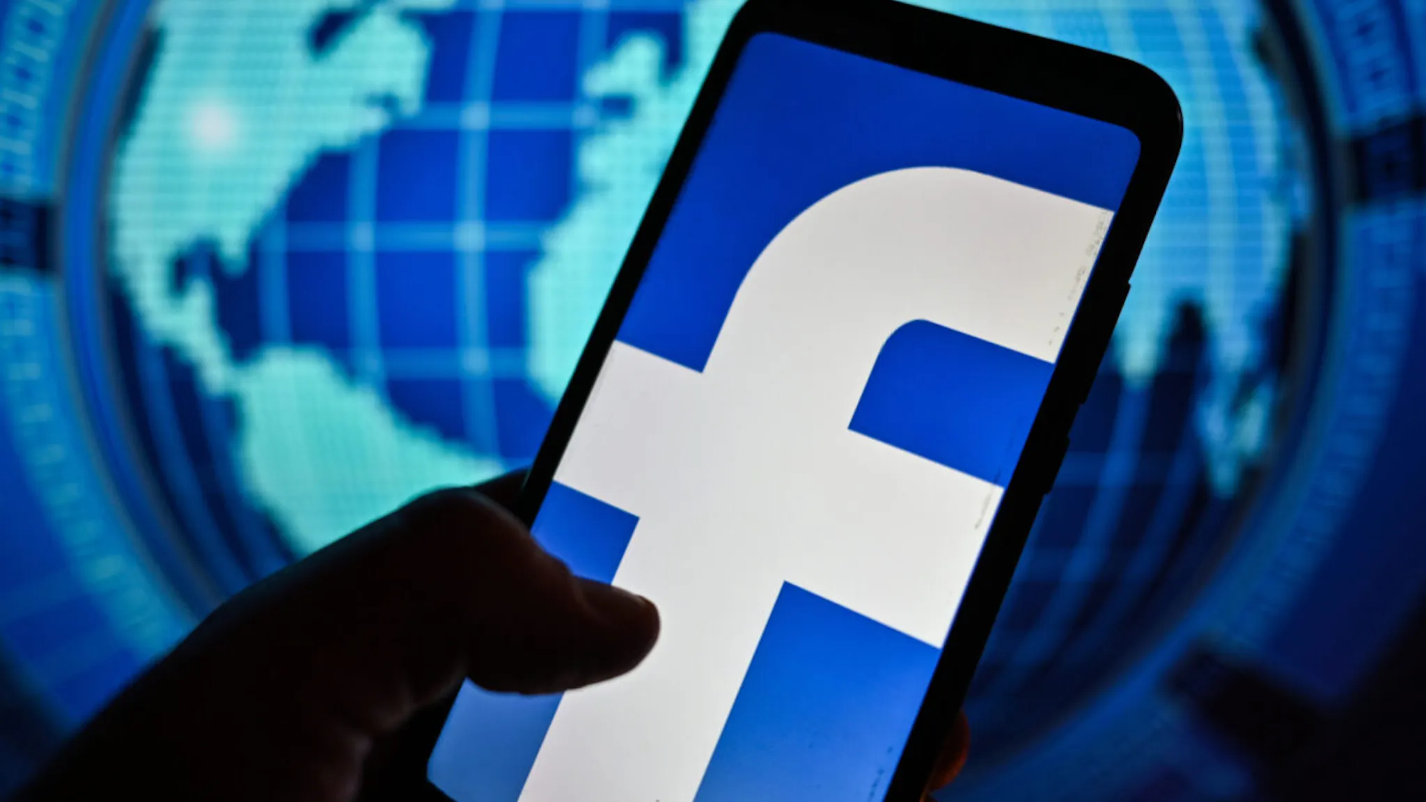 Facebook In this photo illustration a Facebook logo is displayed on