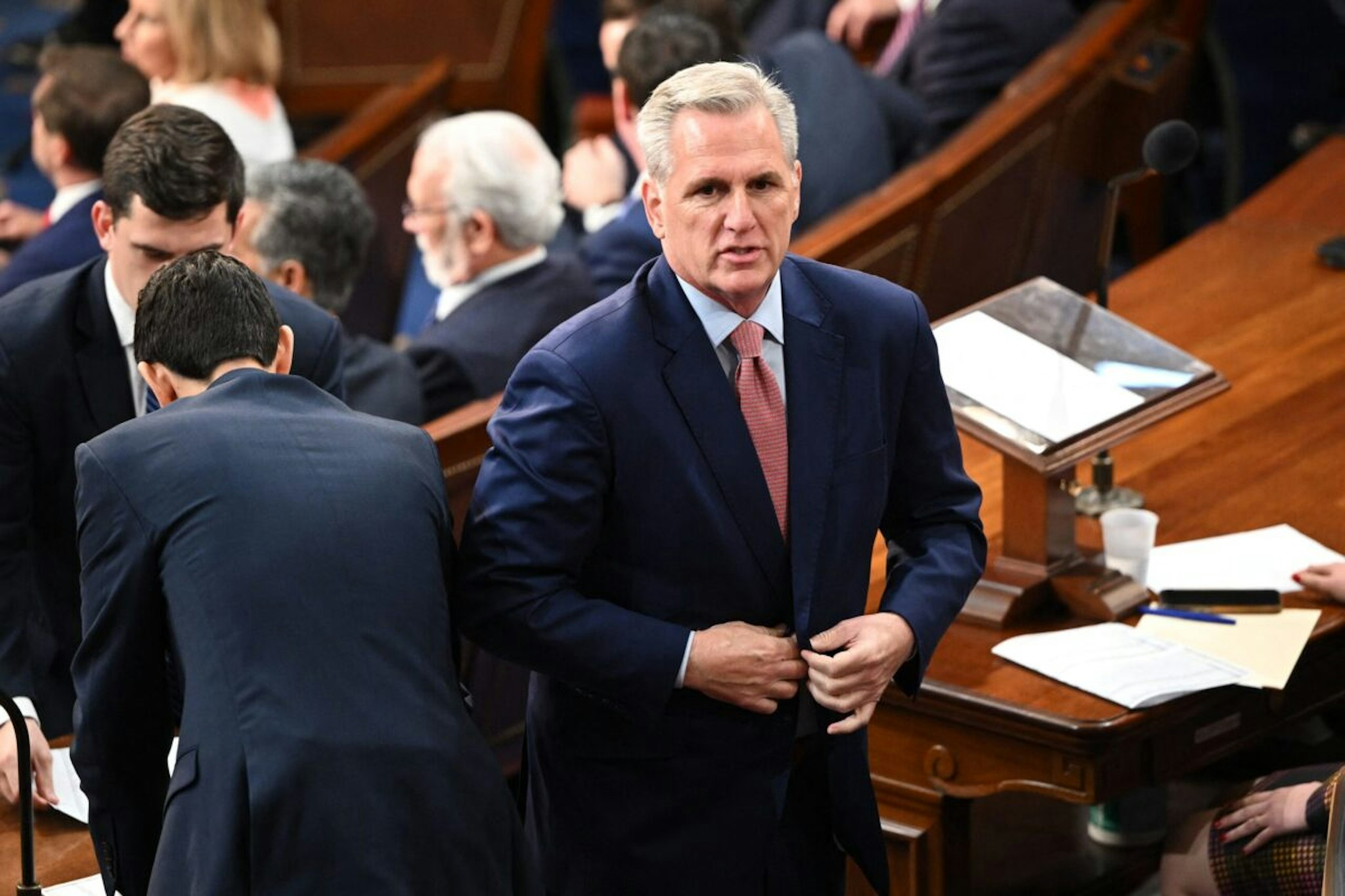 US Republican Representative Kevin McCarthy (R) of California listens as the US House of Representatives convenes for the 118th Congress at the US Capitol in Washington, DC, January 3, 2023.