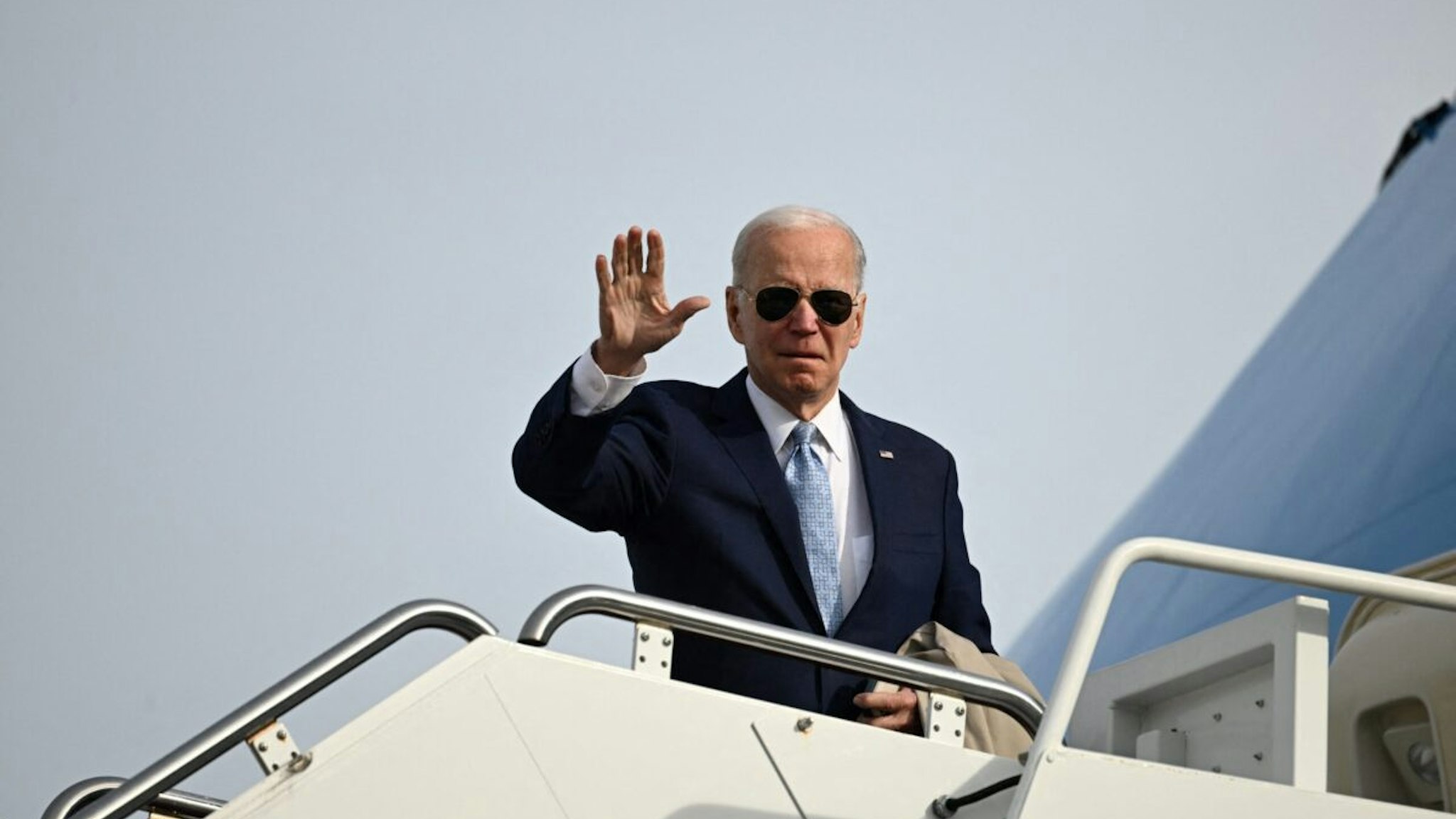 US President Joe Biden boards Air Force One at Joint Base Andrews in Maryland on January 8, 2023. - Biden is travelling to the US-Mexico border in El Paso, Texas, before continuing on to Mexico City.