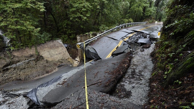SCOTTS VALLEY, CALIFORNIA, US - JANUARY 09: A view of damage on the road after storm and heavy rain in the Santa Cruz Mountains above Silicon Valley in Scotts Valley, California, United States on January 09, 2023.