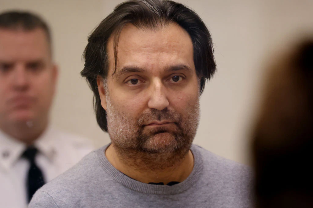 Quincy, MA - January 18: Brian Walshe listens to prosecutor Lynn Beland during his arraignment at Quincy District Court. Nearly two weeks after his wife Ana Walshe, a 39-year-old mother of three, was reported missing by her co-workers, her husband, Brian Walshe, has been charged with her murder. (Photo by Craig F. Walker/The Boston Globe via Getty Images)