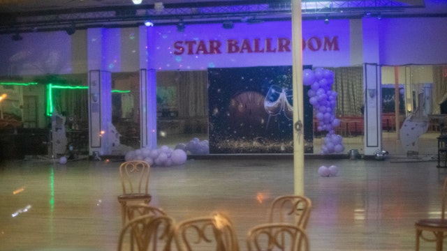 After police tape was taken down, curious bystanders view the crime scene inside the Star Dance Studio Ballroom