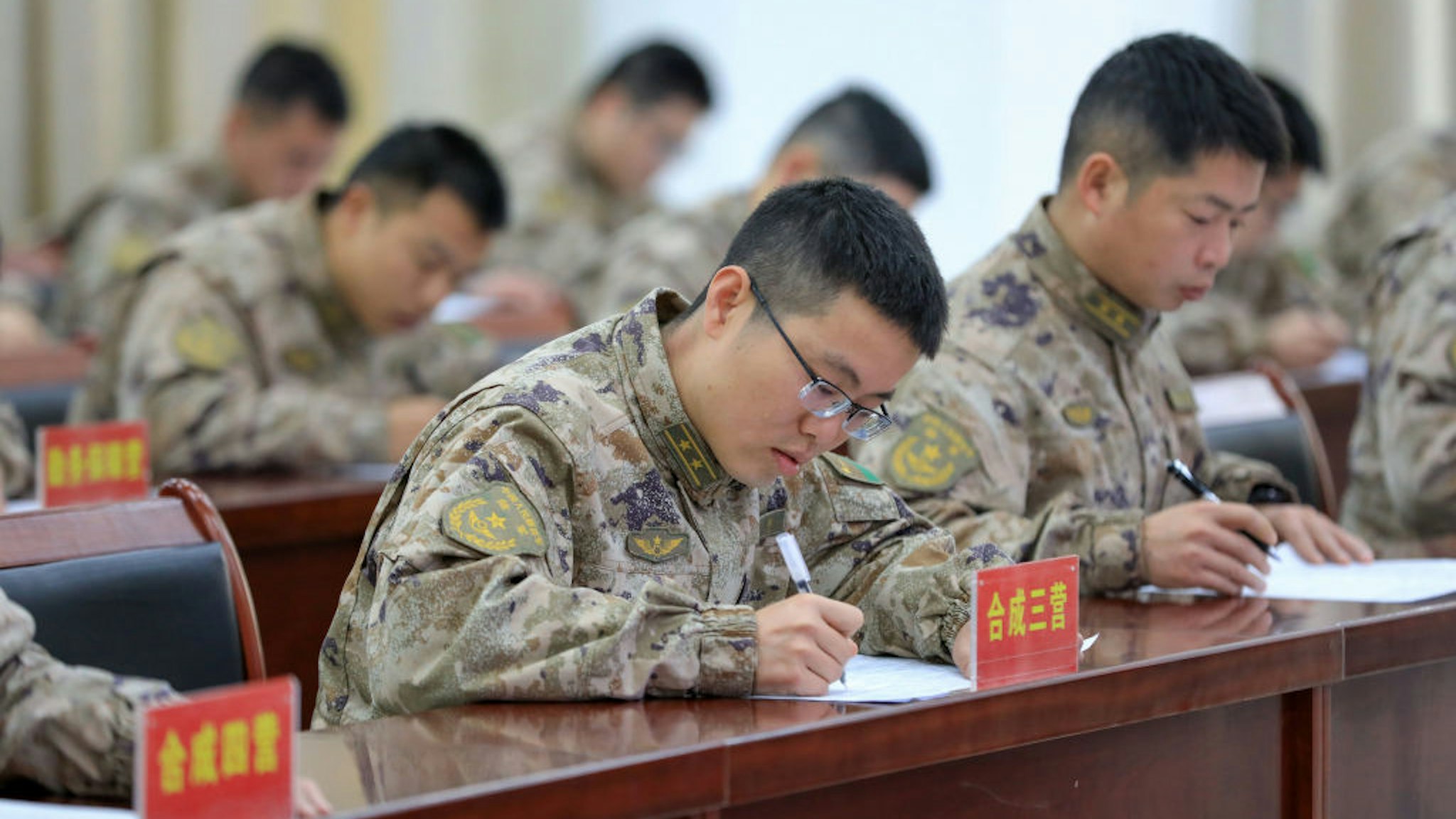 JIANGXI, CHINA - JANUARY 26, 2023 - A brigade of the 72nd Group Army held queue exercises, rules and regulations examination and other activities to test the officers and soldiers' queue literacy and knowledge of laws and regulations, and strengthen the regularized management of the army. January 26, 2023, Jiangxi Province, China. (Photo credit should read CFOTO/Future Publishing via Getty Images)