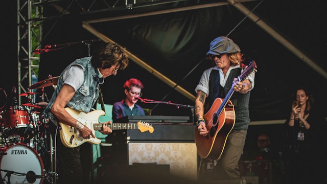 HELSINKI, FINLAND - JUNE 19: Johnny Depp (R) performs on stage with Jeff Beck (L) during the Helsinki Blues Festival at Kaisaniemen Puisto on June 19, 2022 in Helsinki, Finland. (Photo by Venla Shalin/Redferns)
