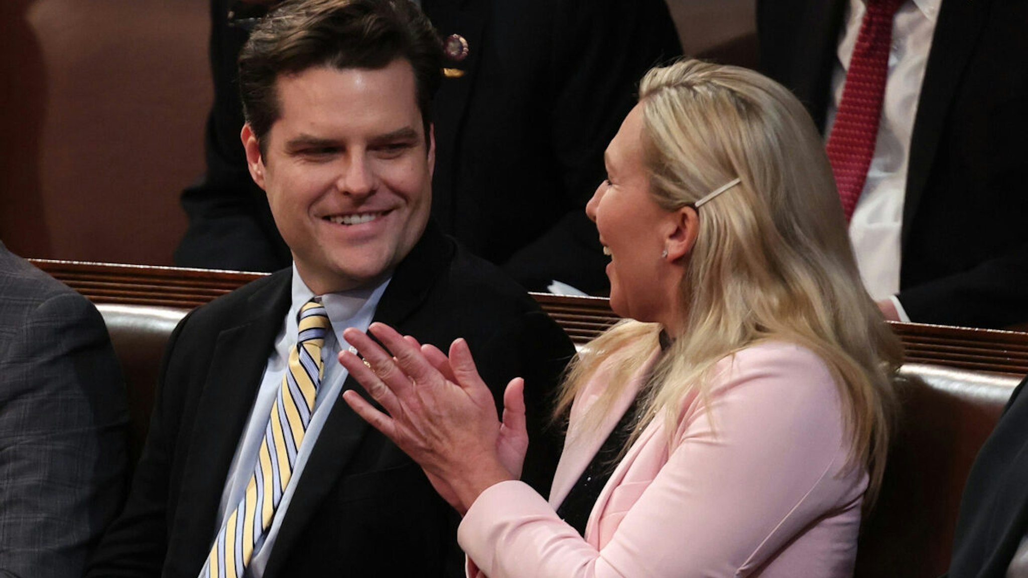 U.S. Rep.-elect Matt Gaetz (R-FL) (L) sits with Rep.-elect Marjorie Taylor Greene (R-GA) in the House Chamber during the third day of elections for Speaker of the House at the U.S. Capitol Building on January 05, 2023 in Washington, DC.