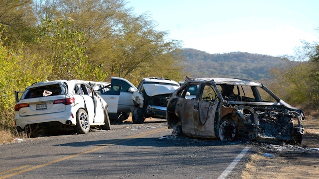 Cars burnt and destroyed during the operation to arrest Ovidio Guzman, aka "El Raton" (The Mouse), son of jailed drug trafficker Joaquin "El Chapo" Guzman, are seen in the Jesus Maria area in Culiacan, Sinaloa State, Mexico, on January 7, 2023, where Ovidio Guzman was arrested on January 5. - Ten soldiers and 19 suspected criminals were killed in an operation to arrest Ovidio Guzman, with a dramatic shootout sowing terror at an airport. Thousands of soldiers retook control of the Sinaloa cartel stronghold of Culiacan, which resembled a war zone after furious gunmen went on the rampage to try to free their boss. Guzman was captured and flown to Mexico City before being transferred to the high-security Altiplano prison in central Mexico from which "El Chapo" once escaped.