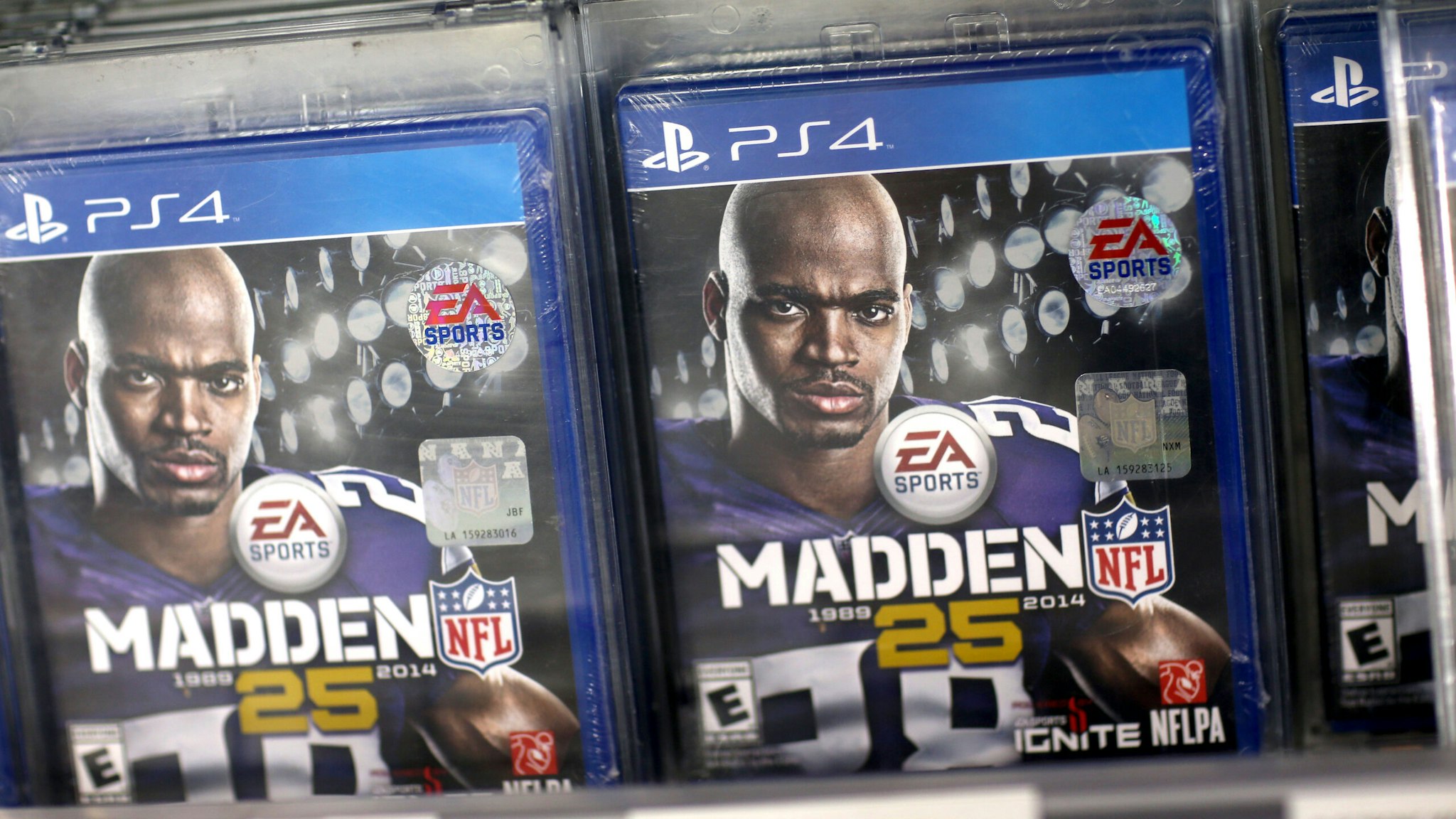 PEMBROKE PINES, FL - NOVEMBER 15: Madden 25 for the new Sony Playstation 4 is seen on display at Best Buy after the console went on sale at midnight on November 15, 2013 in Pembroke Pines, Florida. PlayStation 4 is the follow-up to the company's PlayStation 3 and is priced at $400.
