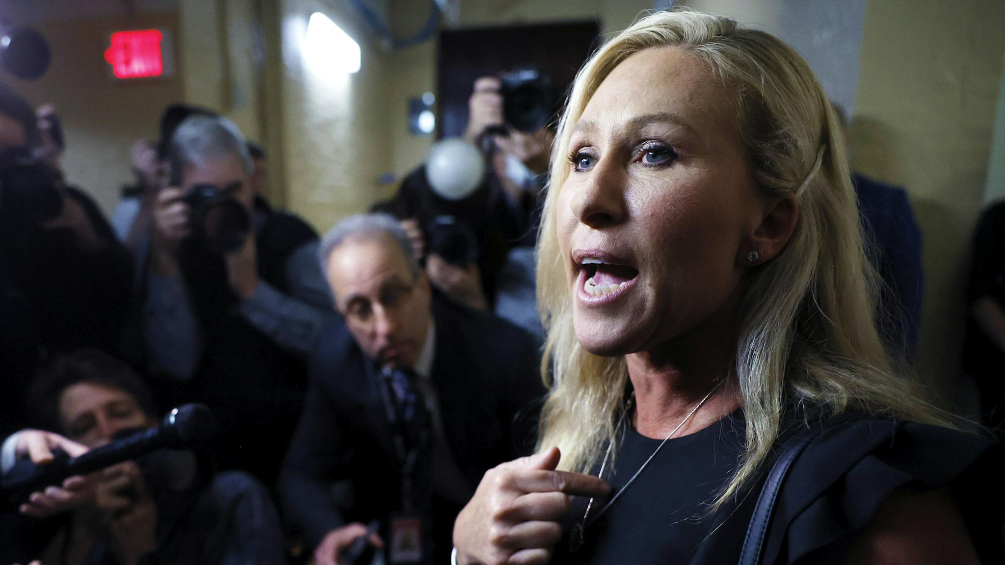 House And Senate Convene For The 118th Congress On Capitol Hill WASHINGTON, DC - JANUARY 03: Rep. Marjorie Taylor Greene (R-GA) talks with reporters after leaving a Republican caucus meeting before the start of the 118th Congress in the basement the U.S. Capitol Building on January 03, 2023 in Washington, DC. Today members of the 118th Congress will be sworn-in and the House of Representatives will elect a new Speaker of the House.