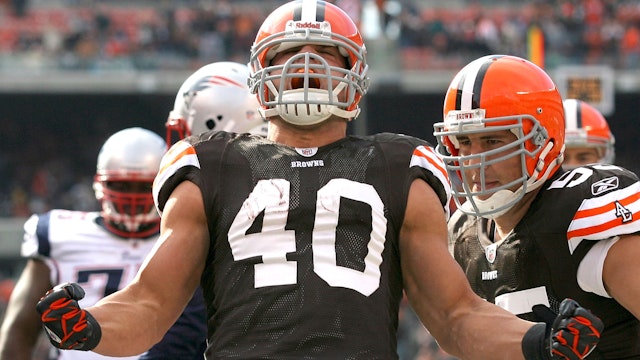 CLEVELAND - NOVEMBER 07: Running back Peyton Hillis #40 and Alex Mack #55 of the Cleveland Browns celebrate after a touchdown against the New England Patriots at Cleveland Browns Stadium on November 7, 2010 in Cleveland, Ohio.