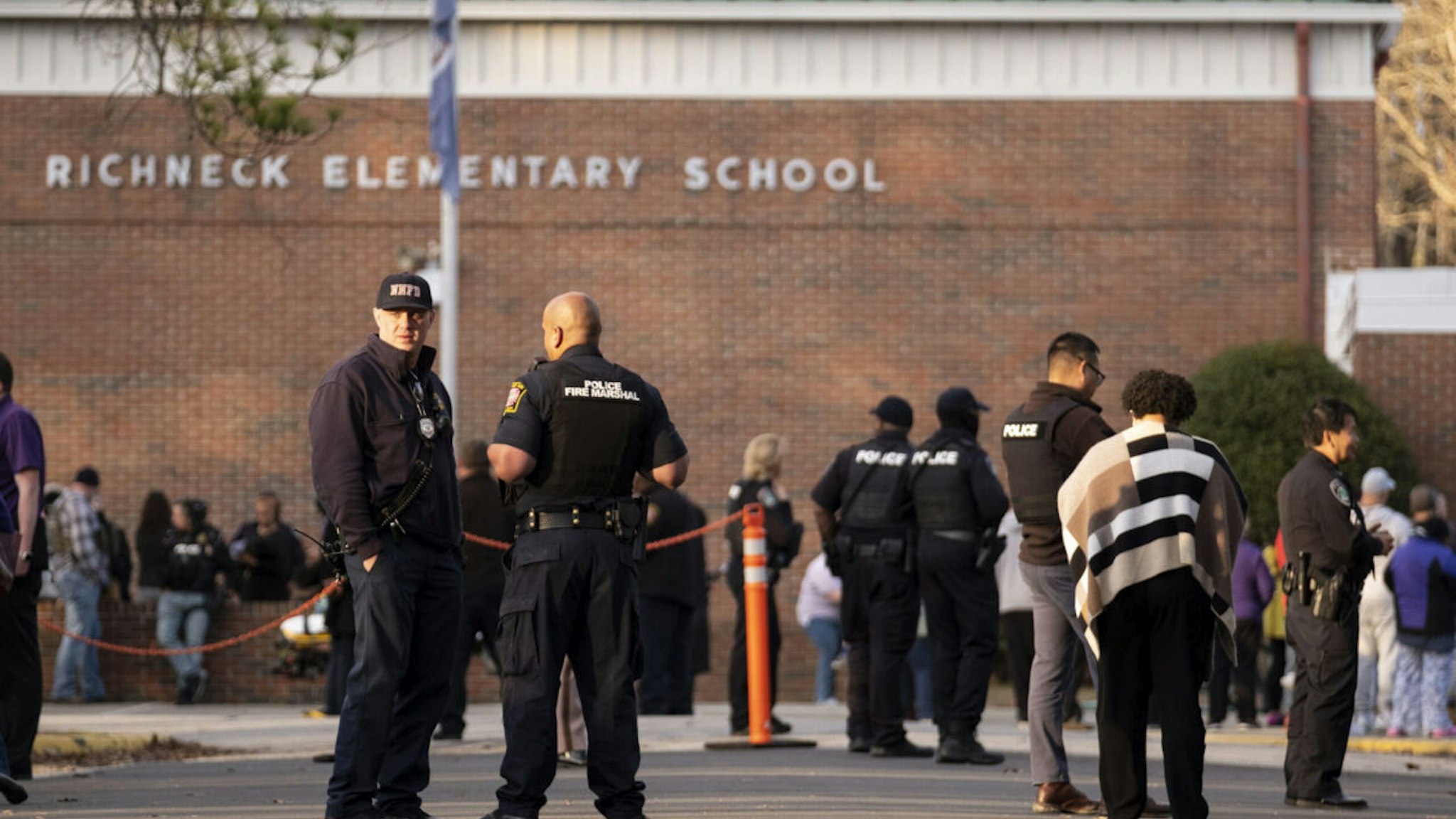 Police respond to a shooting that injured a teacher at Richneck Elementary in Newport News, Virginia, on Jan. 6, 2023