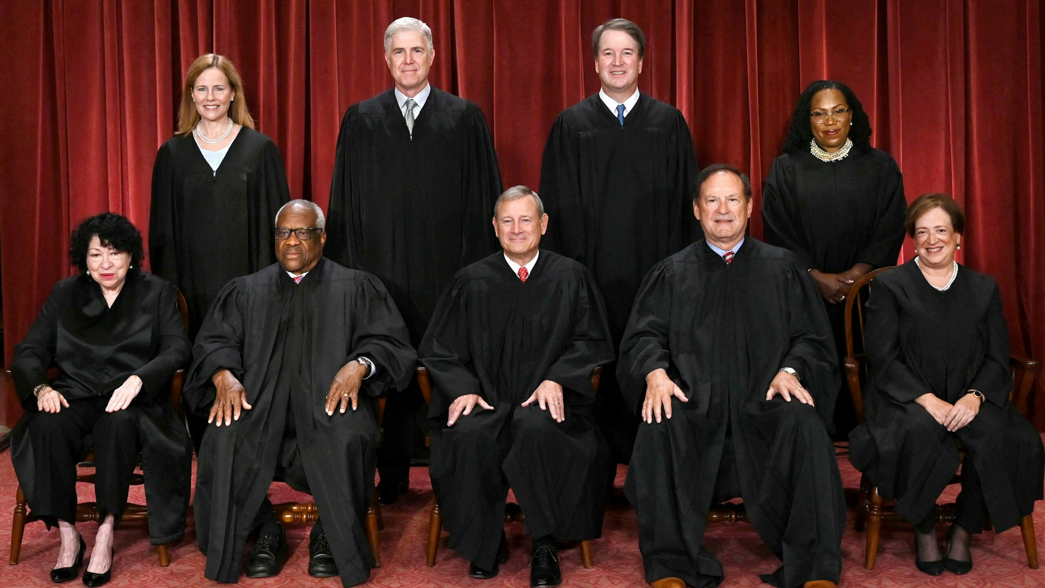 Justices of the US Supreme Court pose for their official photo at the Supreme Court in Washington, DC on October 7, 2022. - (Seated from left) Associate Justice Sonia Sotomayor, Associate Justice Clarence Thomas, Chief Justice John Roberts, Associate Justice Samuel Alito and Associate Justice Elena Kagan, (Standing behind from left) Associate Justice Amy Coney Barrett, Associate Justice Neil Gorsuch, Associate Justice Brett Kavanaugh and Associate Justice Ketanji Brown Jackson.