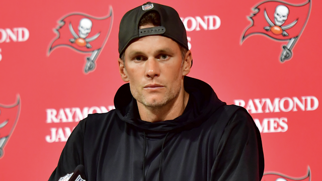 TAMPA, FLORIDA - JANUARY 16: Tom Brady #12 of the Tampa Bay Buccaneers speaks to the media after losing to the Dallas Cowboys 31-14 in the NFC Wild Card playoff game at Raymond James Stadium on January 16, 2023 in Tampa, Florida.