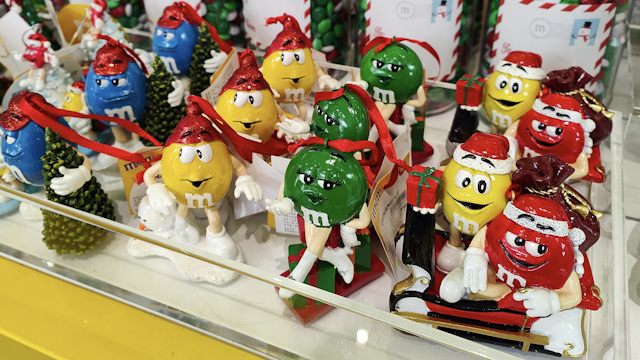 SHANGHAI, CHINA - NOVEMBER 22, 2022 - A variety of Christmas-related items are seen at M&M's flagship store in Shanghai, China, November 22, 2022. Including socks, candy, clothing, doll ornaments and so on.