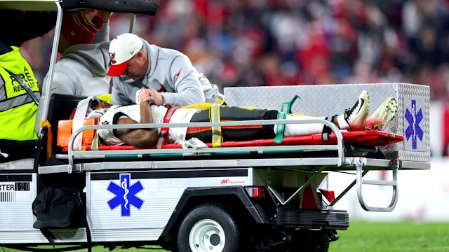 TAMPA, FLORIDA - JANUARY 16: Russell Gage #17 of the Tampa Bay Buccaneers is carted off the field after suffering an injury against the Dallas Cowboys during the fourth quarter in the NFC Wild Card playoff game at Raymond James Stadium on January 16, 2023 in Tampa, Florida.