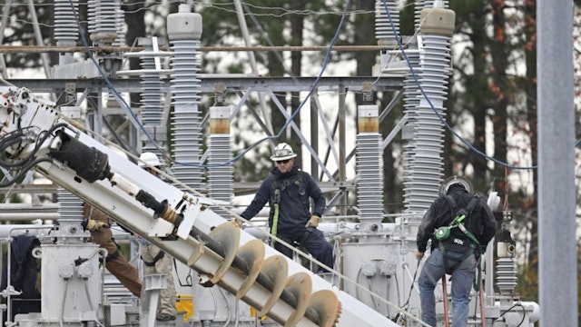 A view of the substation while work is in progress as tens of thousands are without power on Moore County after an attack at two substations by Duke Electric were shot at in Carthage NC, United States on December 05, 2022.