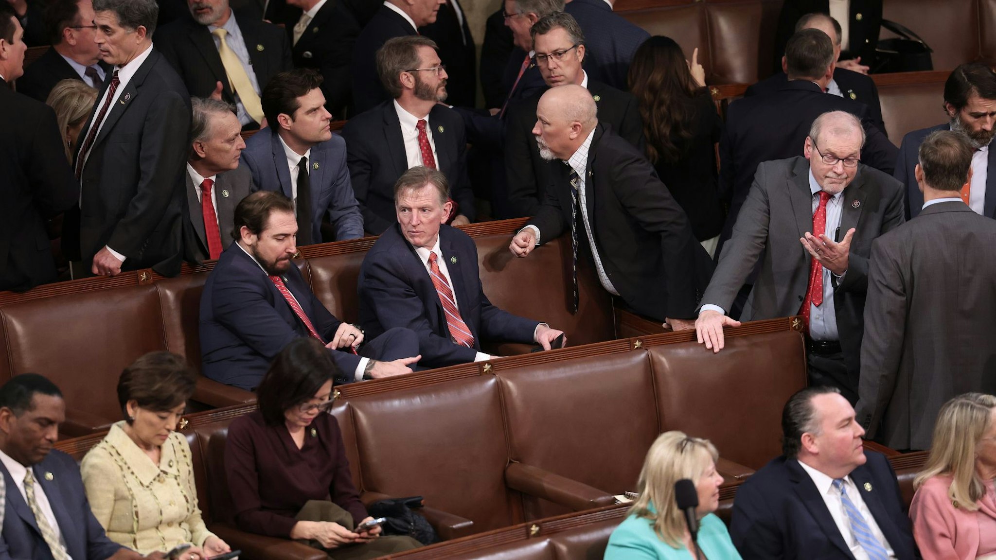 WASHINGTON, DC - JANUARY 04: House Republican, including members of the Freedom Caucus, wait for the results of a vote to adjourn following a day of votes for the new Speaker of the House at the U.S. Capitol on January 04, 2023 in Washington, DC. The House of Representatives is attempting to elect the next Speaker after House after Republican leader Kevin McCarthy (R-CA) has failed to earn more than 218 votes on six ballots over two days, the first time in 100 years that the Speaker was not elected on the first ballot.