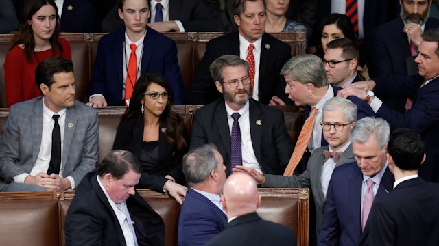 U.S. Rep.-elect Mike Rogers (R-AL) is restrained by Rep.-elect Richard Hudson (R-NC) after getting into an argument with Rep.-elect Matt Gaetz (R-FL) as House Republican Leader Kevin McCarthy (R-CA) walks away, in the House Chamber during the fourth day of elections for Speaker of the House at the U.S. Capitol Building on January 06, 2023 in Washington, DC.