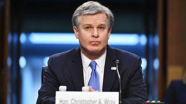 FBI Director Christopher Wray arrives to testify before the Senate Judiciary Committee on the January 6th insurrection, in the Hart Senate Office Building on Capitol Hill in Washington, DC on March 2, 2021.