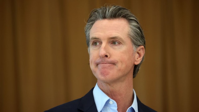 California Gov. Gavin Newsom looks on during a news conference after he toured the newly reopened Ruby Bridges Elementary School on March 16, 2021 in Alameda, California.