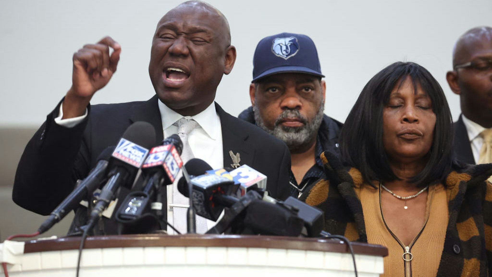 MEMPHIS, TENNESSEE - JANUARY 27: Flanked by Rodney Wells (C) and RowVaughn Wells, the stepfather and mother of Tyre Nichols, civil rights attorney Ben Crump speaks during a press conference on January 27, 2023 in Memphis, Tennessee. Tyre Nichols, a 29-year-old Black man, died three days after being severely beaten by five Memphis Police Department officers during a traffic stop on January 7, 2023. Memphis and cities across the country are bracing for potential unrest when the city releases video footage from the beating to the public later this evening. (Photo by Scott Olson/Getty Images)