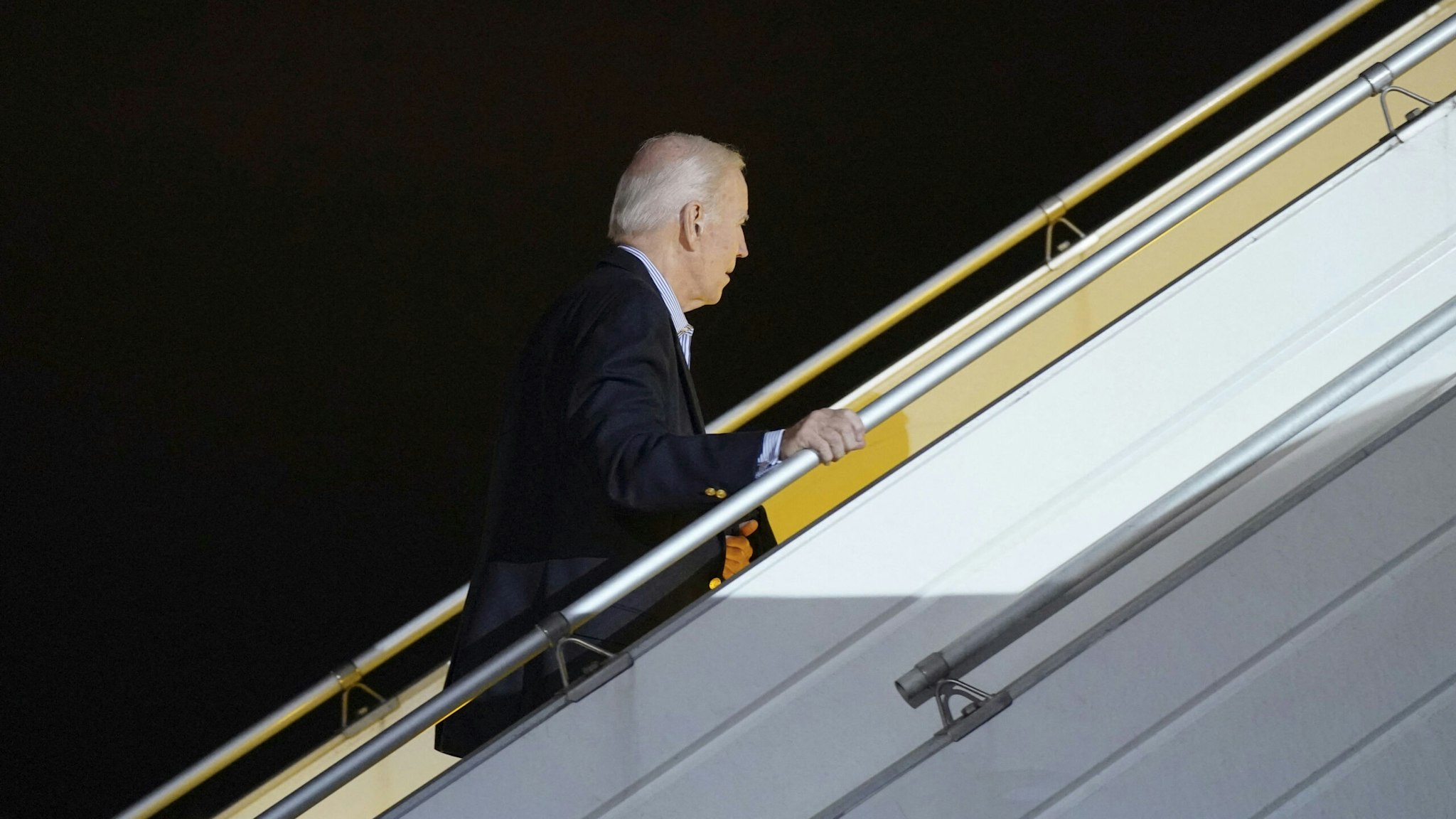US President Joe Biden boards Air Force One at Rzeszow-Jasionka Airport in Jasionka, Poland, on February 20, 2023.