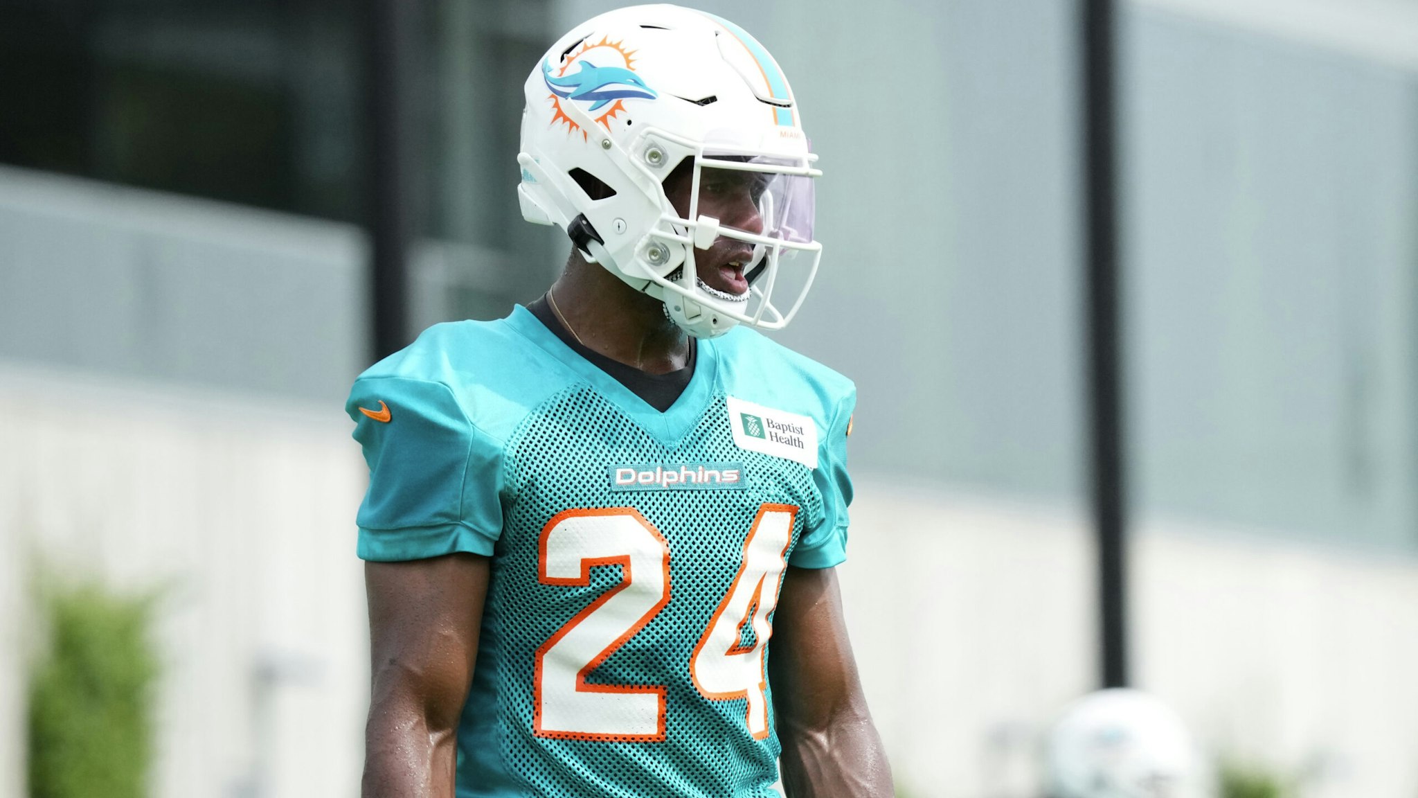 MIAMI GARDENS, FLORIDA - AUGUST 02: Cornerback Byron Jones #24 of the Miami Dolphins looks on during Training Camp at Baptist Health Training Complex on August 02, 2021 in Miami Gardens, Florida.