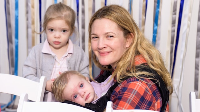 Drew Barrymore, Olive Barrymore Kopelman and Frankie Barrymore Kopelman attend Baby2Baby Holiday Party Presented By The Honest Company on December 13, 2014 in Los Angeles, California.
