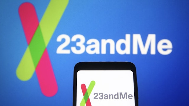 In this photo illustration, 23andMe logo of a biotechnology... UKRAINE - 2021/06/17: In this photo illustration, 23andMe logo of a biotechnology company is seen on a smartphone and a pc screen in the background. (Photo Illustration by Pavlo Gonchar/SOPA Images/LightRocket via Getty Images) SOPA Images / Contributor
